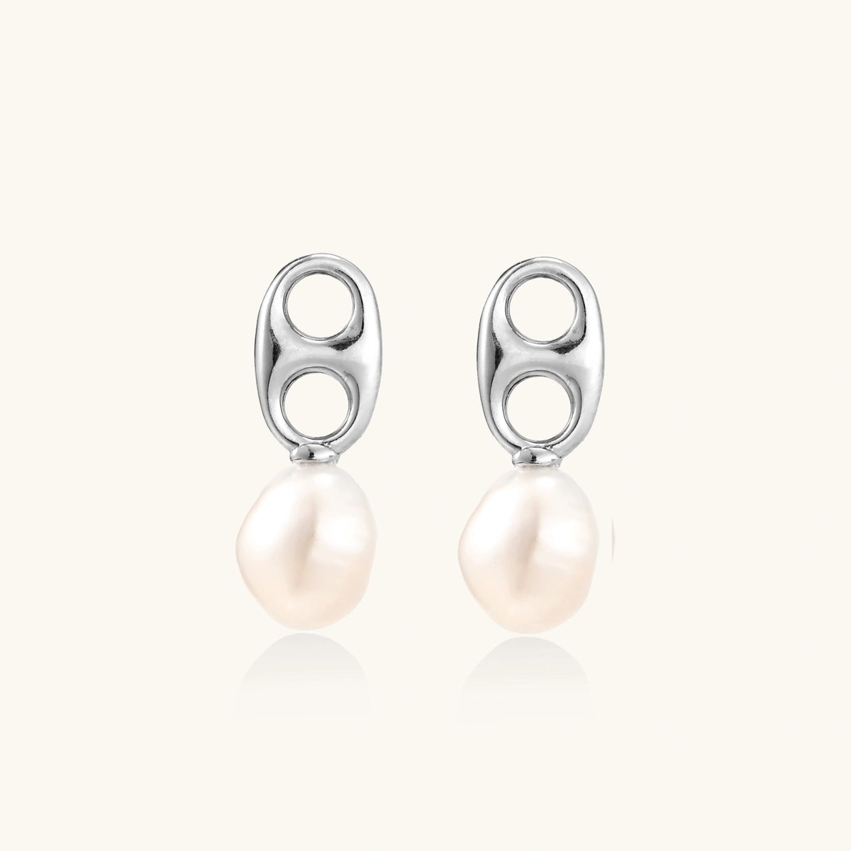 Modern rhodium-plated silver earrings with geometric double-circle design and freshwater pearl drops
