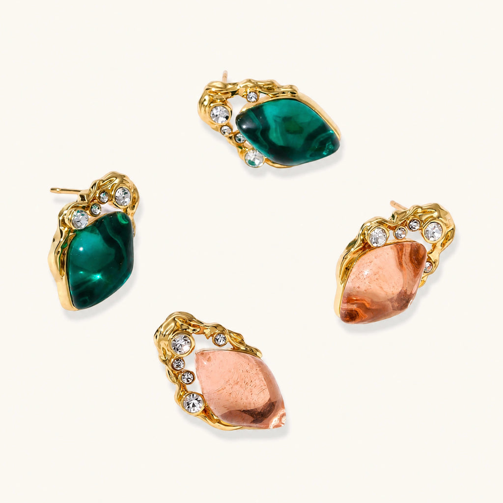 Gold-plated stud earrings featuring teardrop emerald green liuli stones with cubic zirconia crystal accents on white background.