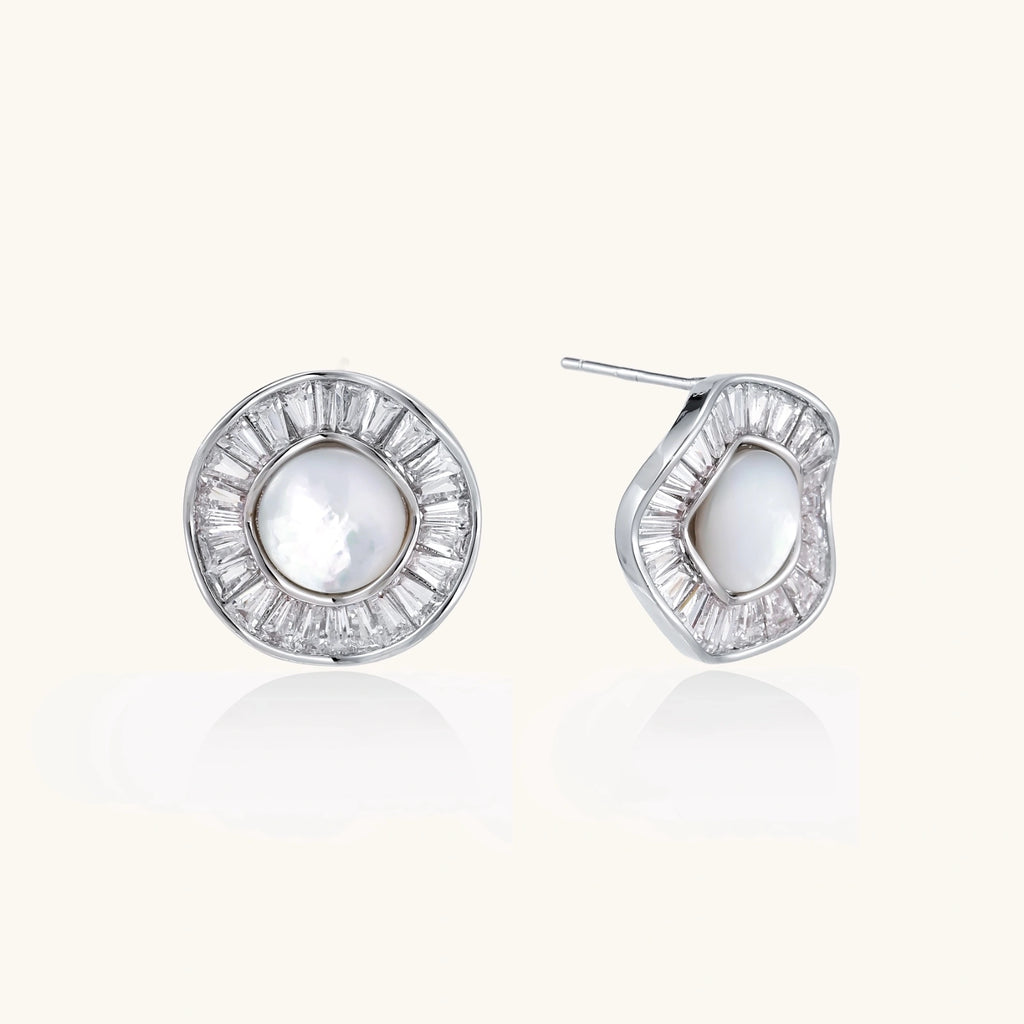 Round white gold-plated stud earrings with mother of pearl center and baguette crystal halo surround, 16.2mm diameter.