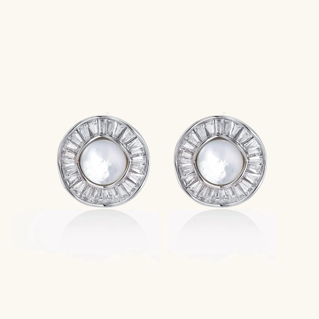 Round white gold-plated stud earrings with mother of pearl center and baguette crystal halo surround, 16.2mm diameter.