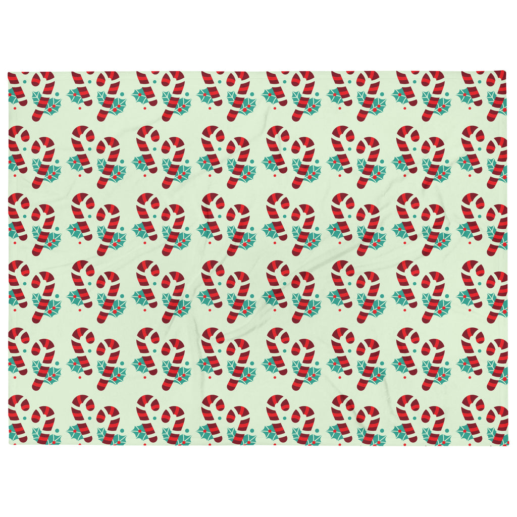 Green Christmas throw blanket with candy cane design, front view, image 1