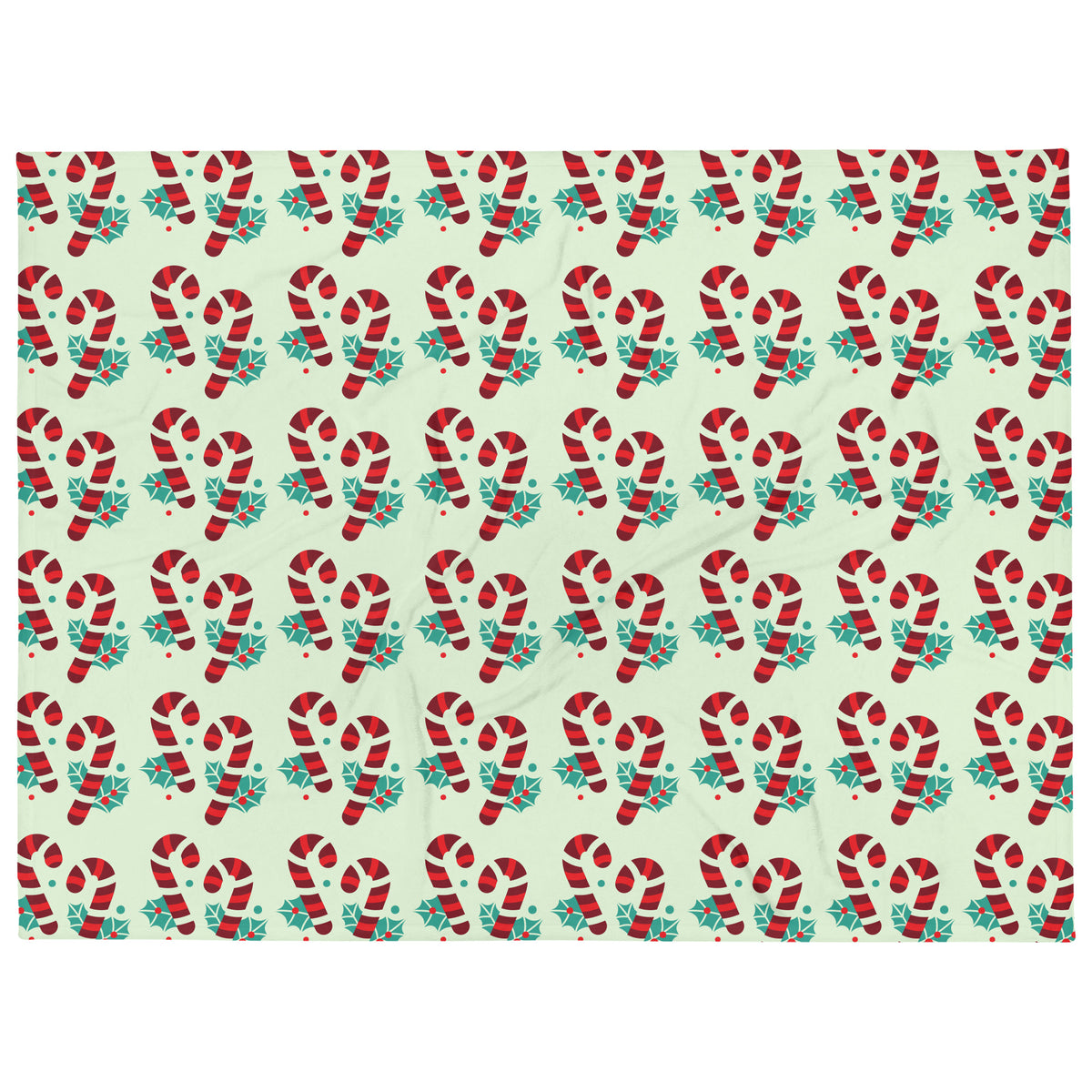 Green Christmas throw blanket with candy cane design, front view, image 1