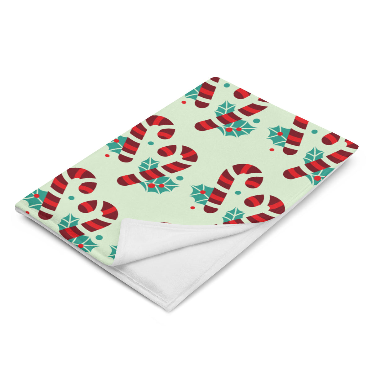 Green Christmas throw blanket with candy cane design, left front view
